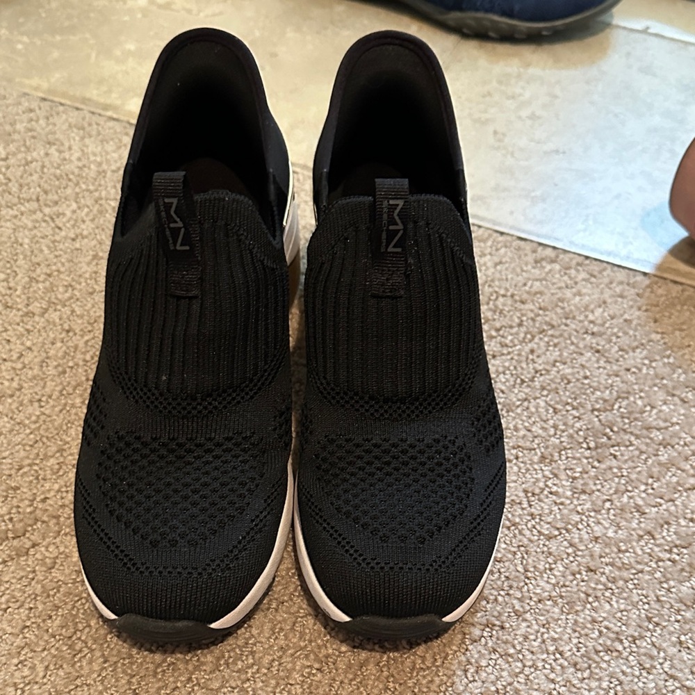Skechers Black Knit Slip-On Sneakers with White Midsole